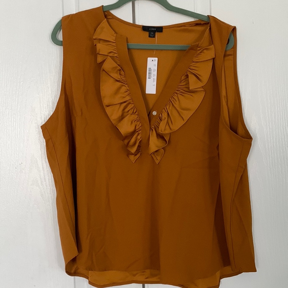 Plus size Sleeveless ruffle front blouse
